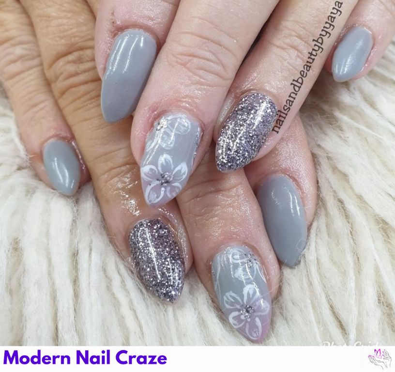 Light gray base with sculpted 3D floral nail art, perfect for weddings.
