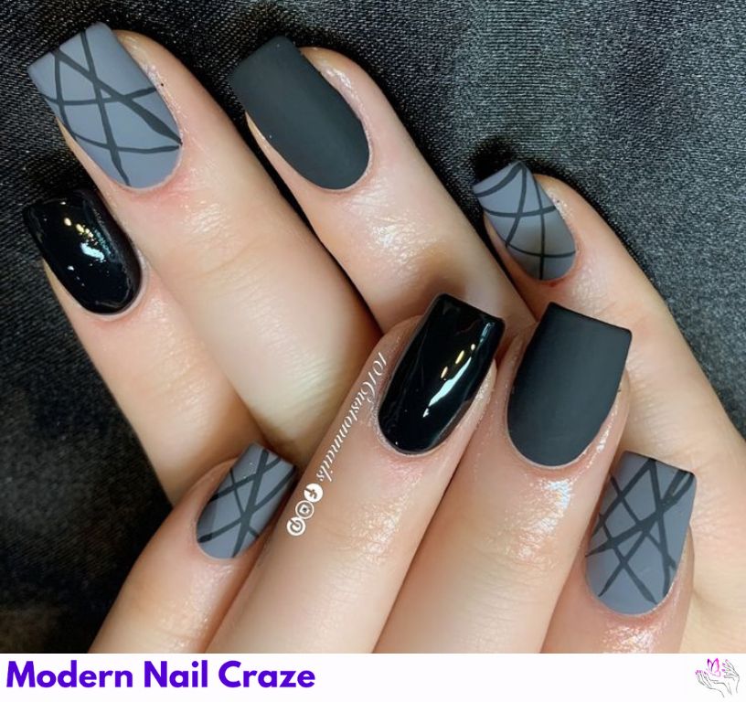 Gray nail design with sharp geometric shapes in black and white outlines