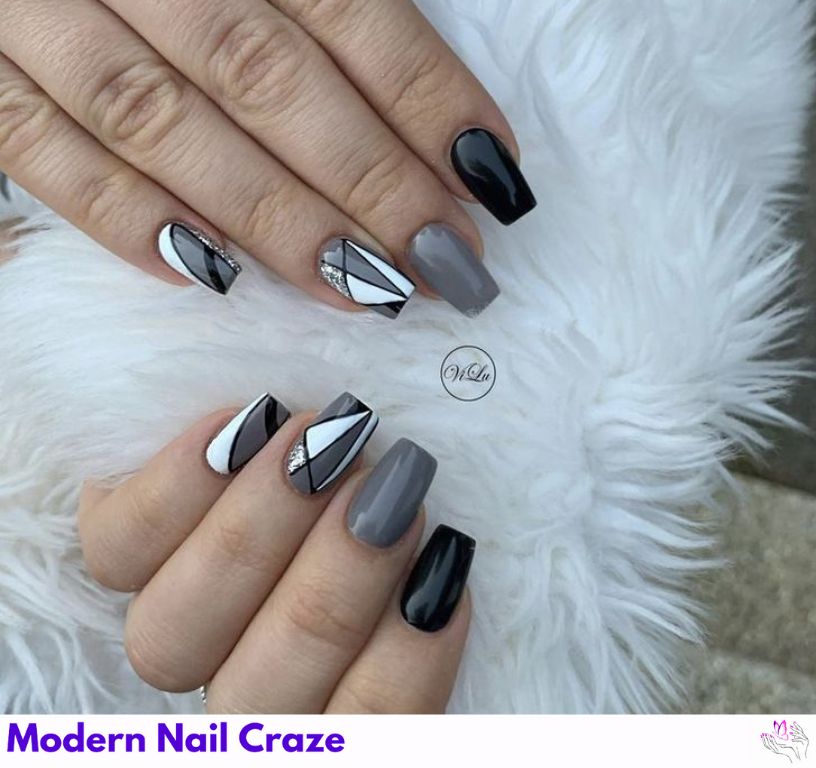 High-contrast gray and black aura nails with chrome fading effect.