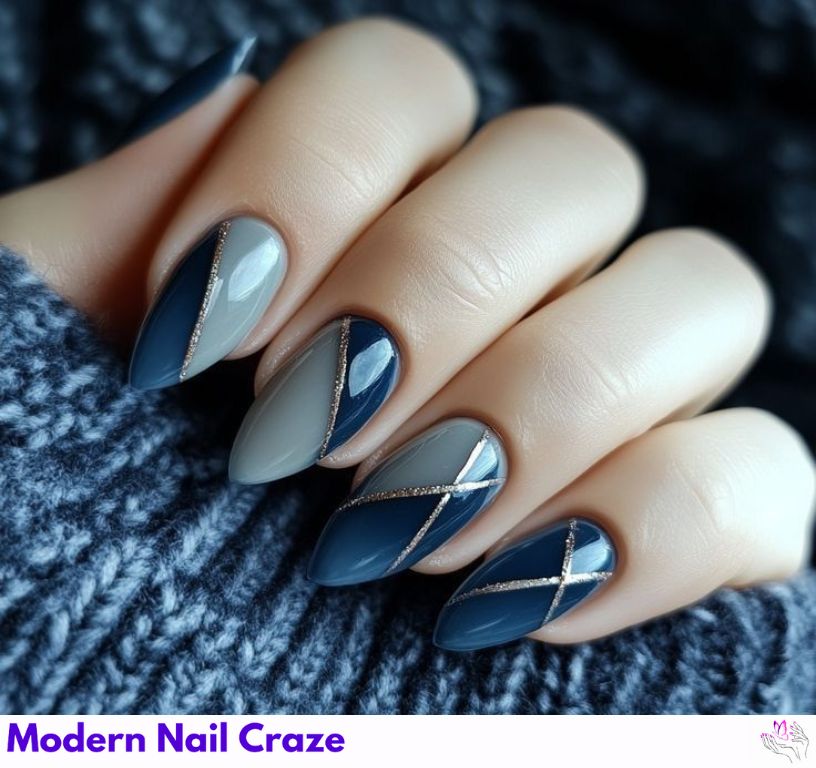 Cool-toned nails with slate gray and sky blue accent color blocking.