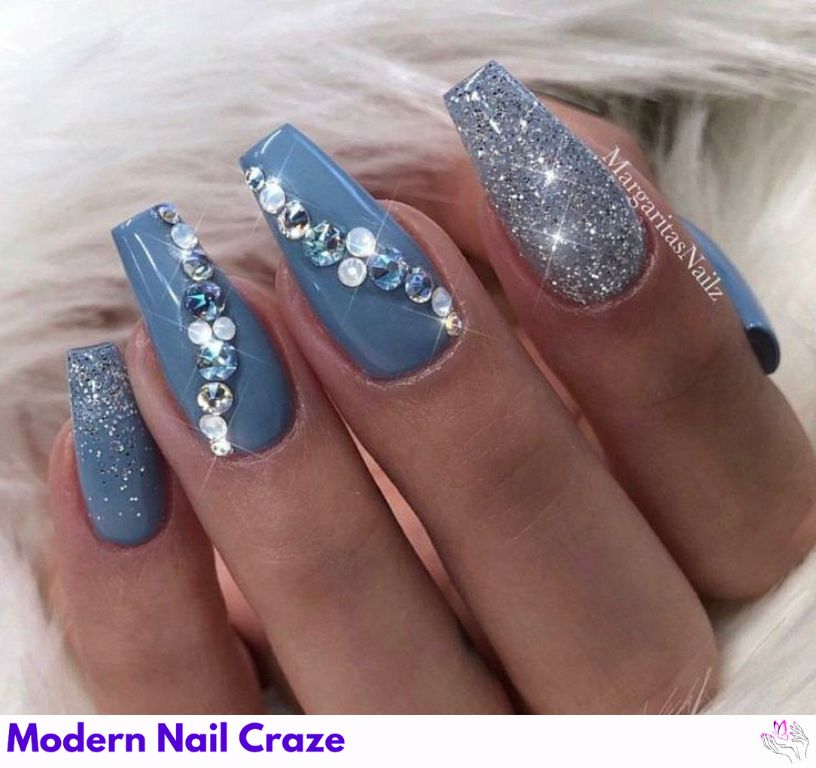 Warm greige nails with tiny crystal rhinestones on ring fingers.