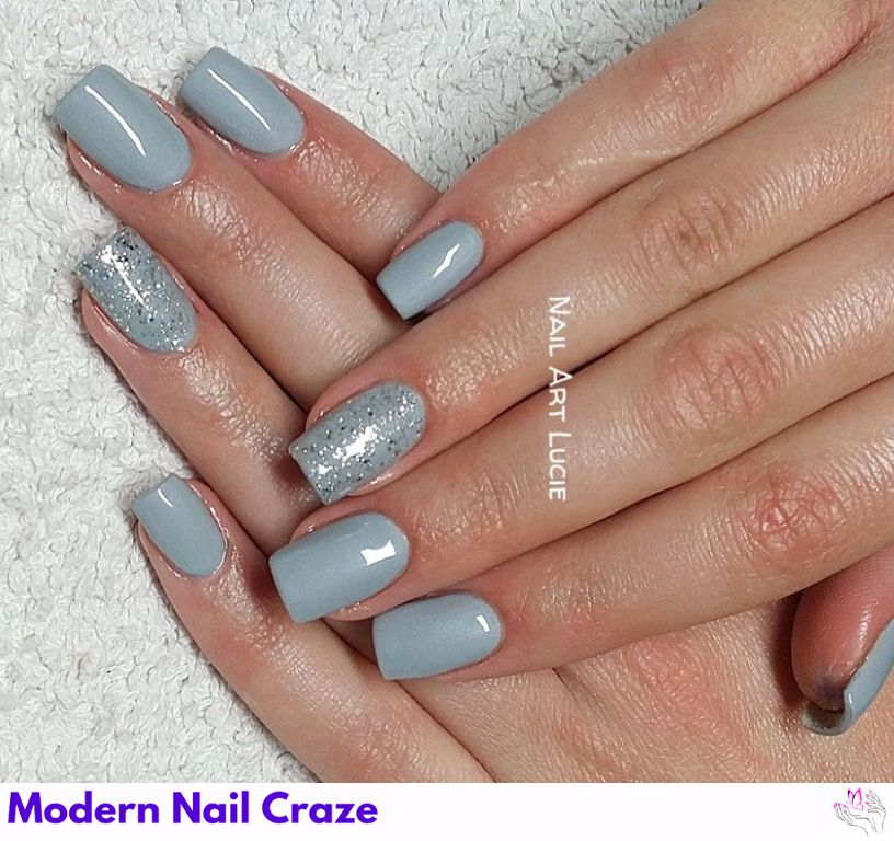 Smooth satin-finish gray nails on rounded nails for a soft matte glow.