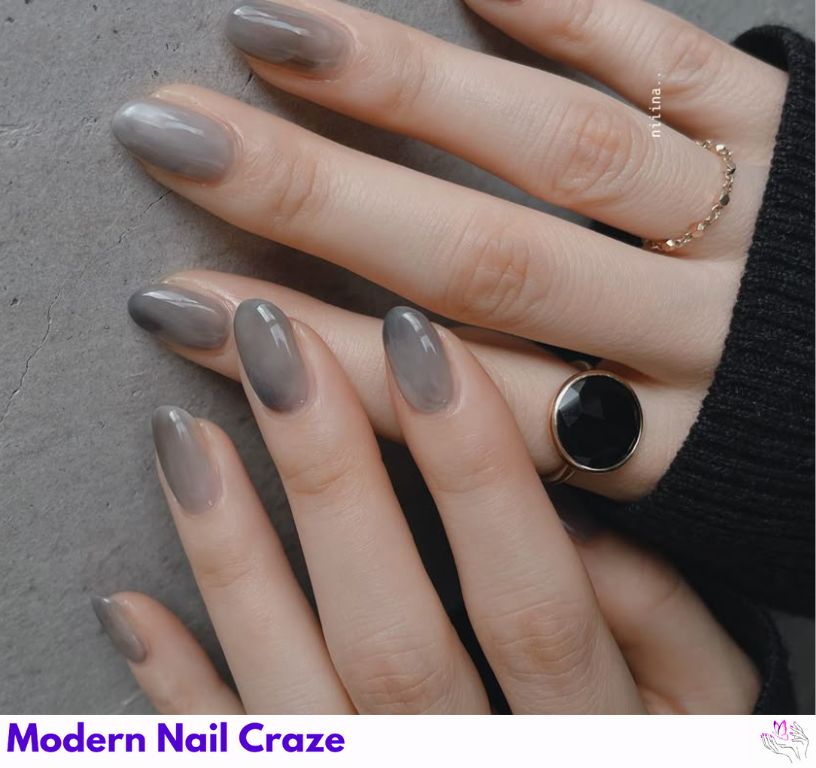 Almond-shaped nails with soft suede-like matte gray topcoat.