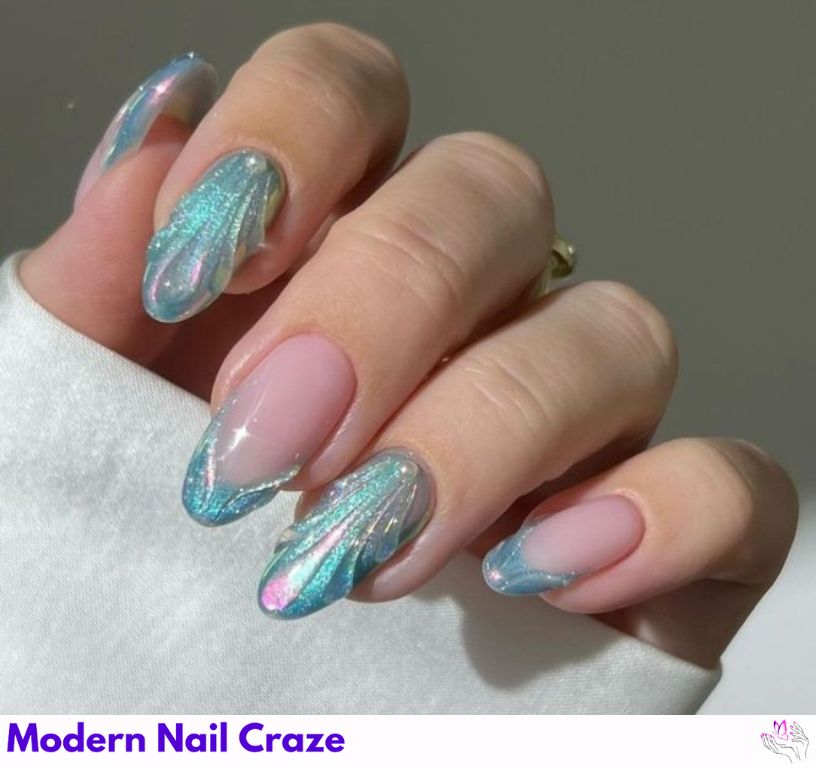 Iridescent chrome mermaid nails with a shimmering, changing finish.