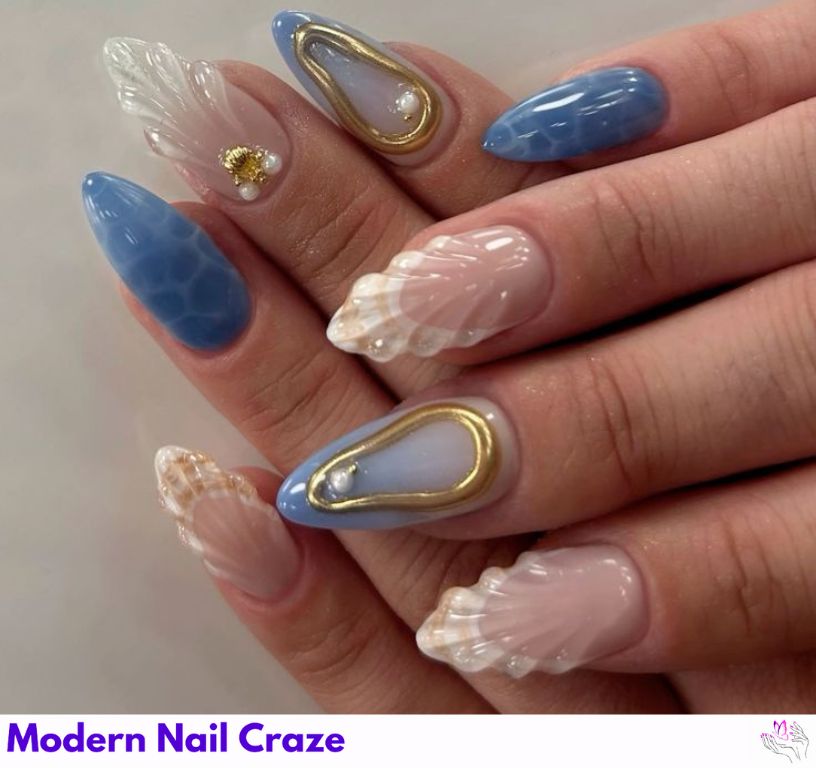 Almond-shaped mermaid nails with a sophisticated ocean touch.