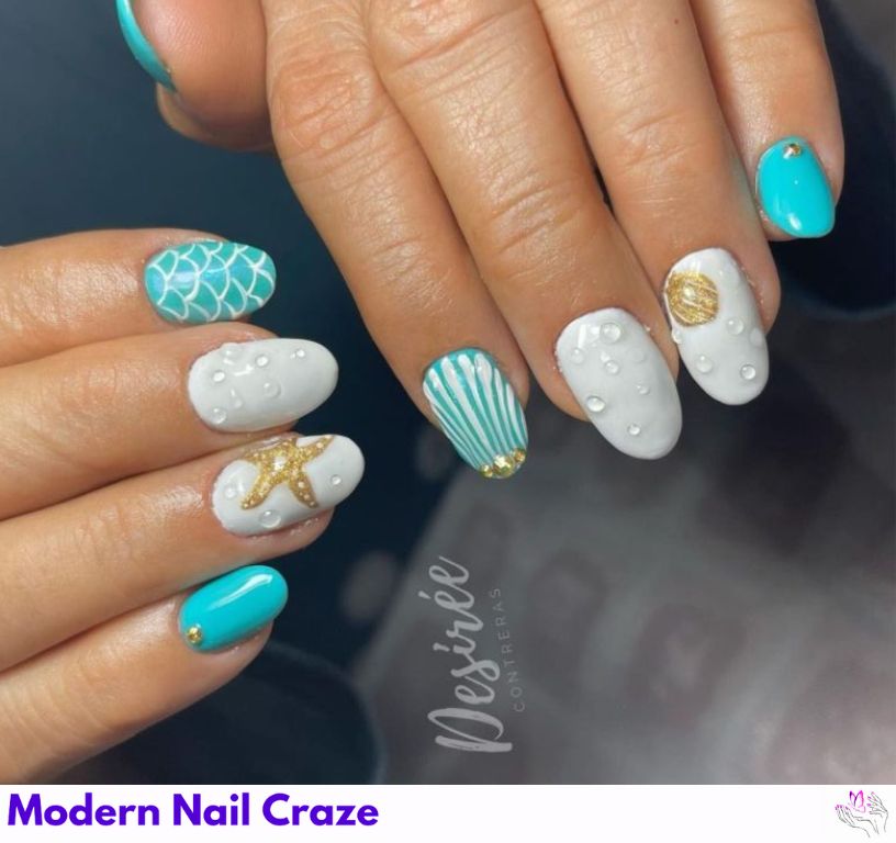 Waterdrop ocean mermaid nails with white and blue tones.