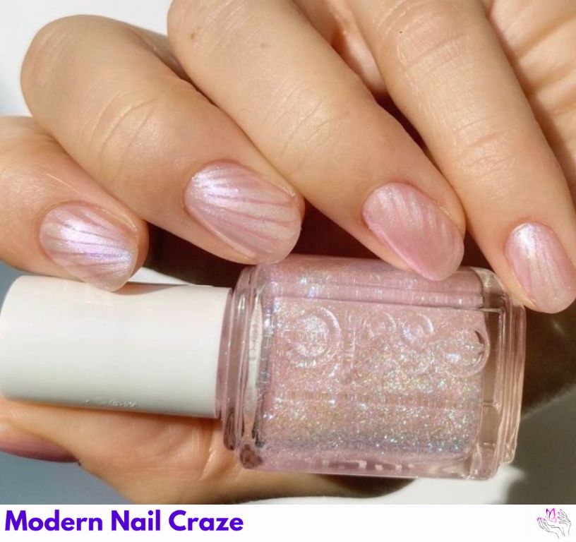 Pearly seashell nails with a subtle, delicate finish for beach weddings.