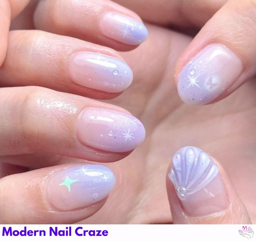 Ombre mermaid nails with a sand-to-ocean gradient effect.
