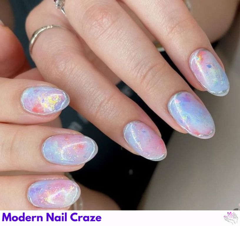 Melty pastel mermaid nails with fairy dust and shimmering flakes.