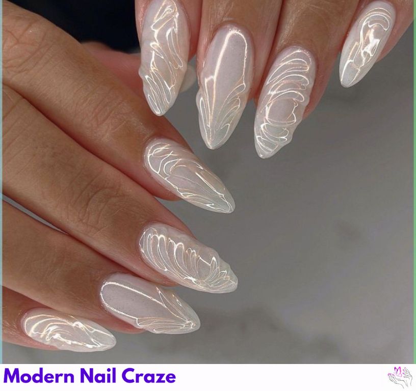 3D chrome almond nails with raised texture and metallic finish.