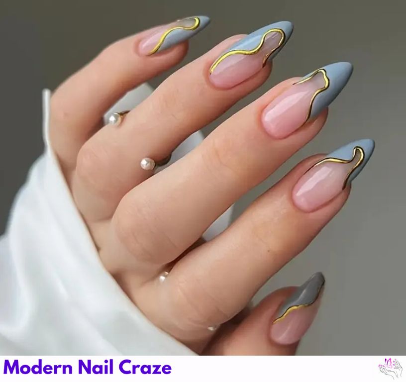 Abstract neutral almond nails in taupe and beige swirls, a contemporary look.