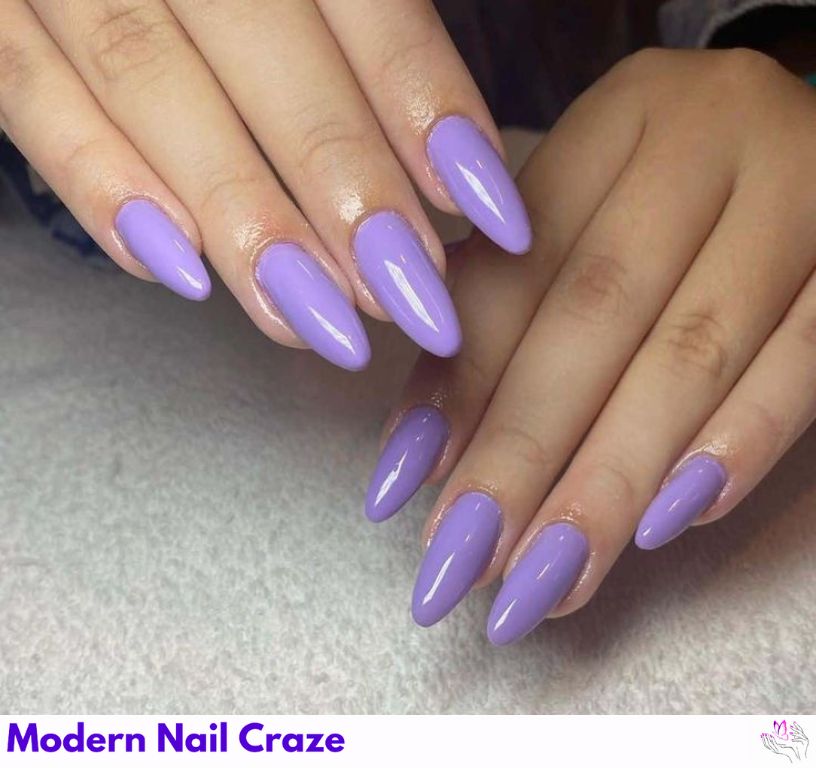 Lavender haze almond nails with soft shimmer, dreamy and romantic.