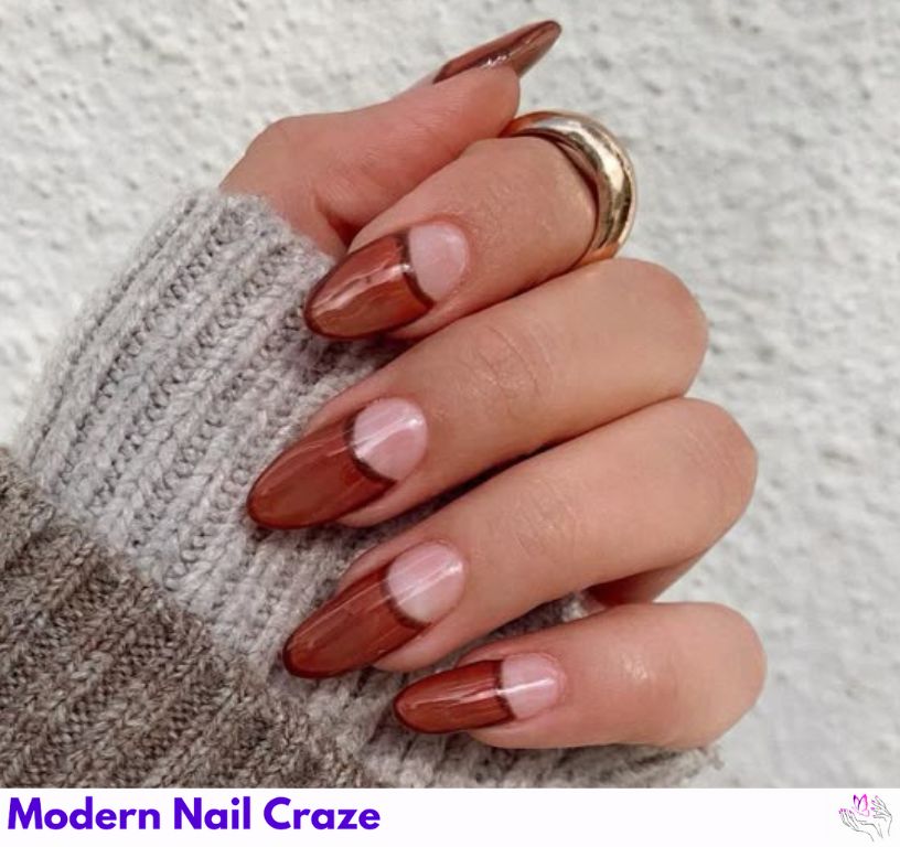 Minimal moon almond nails with a half-moon design near the cuticles.