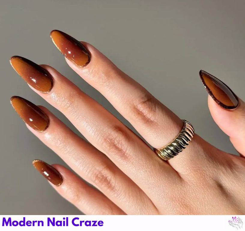 Mocha brown almond nails with rich earthy tones, cozy and stylish.
