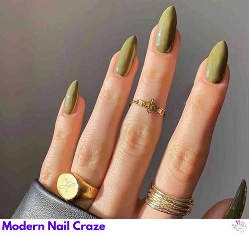 Olive green almond nails with gold foil accents for a chic twist.