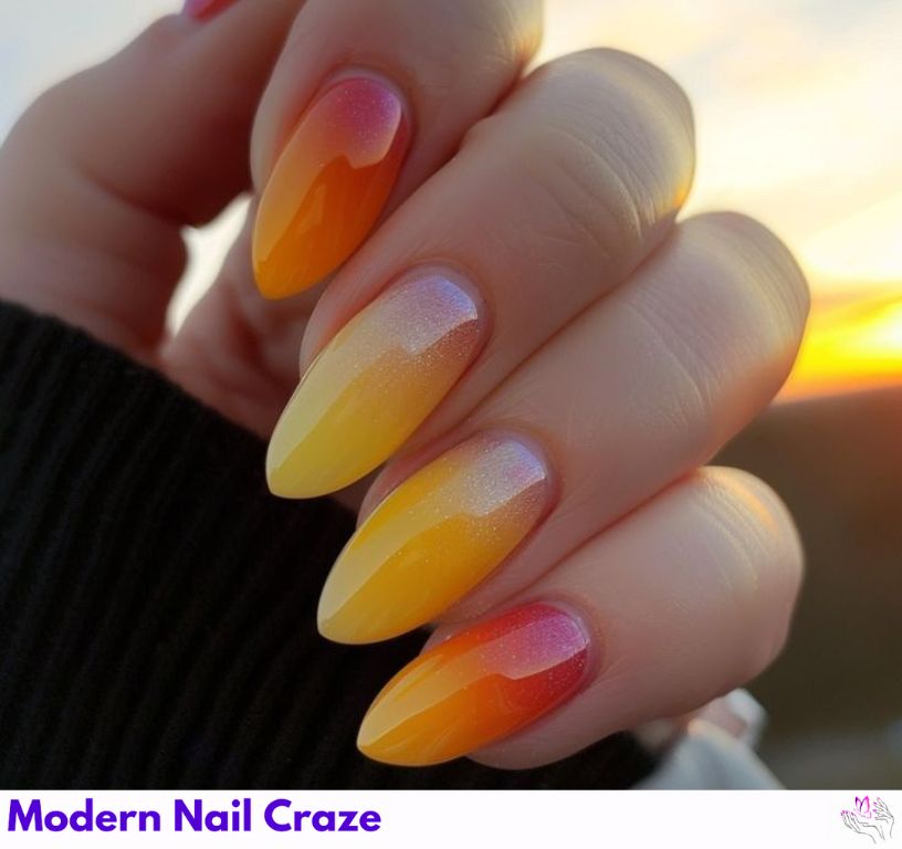 Sunset gradient almond nails blending coral, orange, and pink tones.