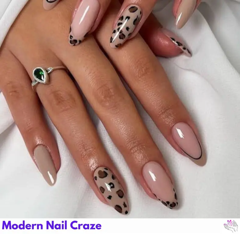 Almond-shaped nails with animal prints, perfect for embracing fall fashion in style.