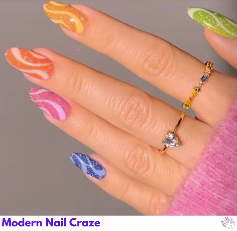 Glitter Swirl Rainbow Nails featuring colorful, sparkling patterns for a fun and glamorous nail art design.