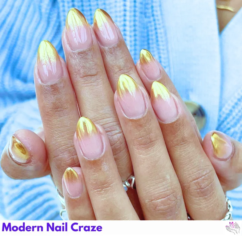 Elegant gold tip chrome ombre nails with a shimmering gradient for a chic, luxurious look.