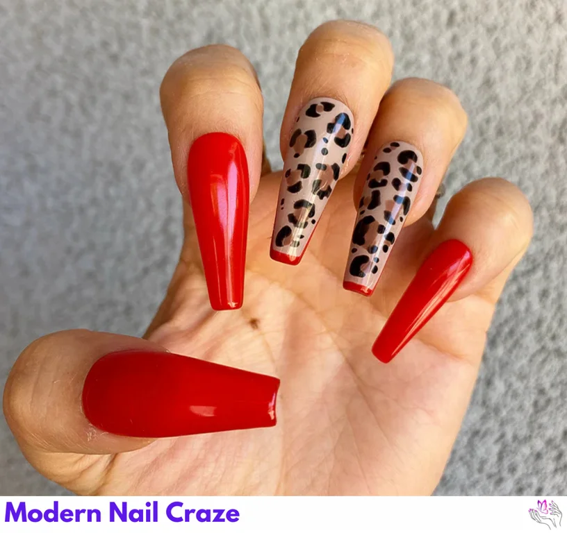 Vibrant leopard print design on red and white nails, perfect for a striking, exotic look.