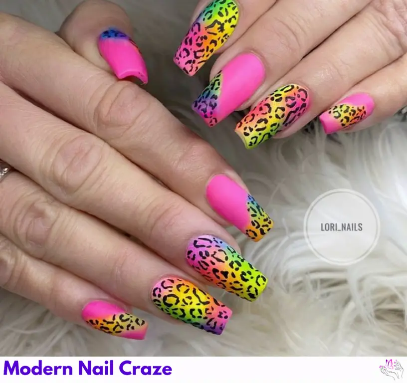 Minimalist neon leopard print nails with bright spots on a sheer base, perfect for a striking and fun style.