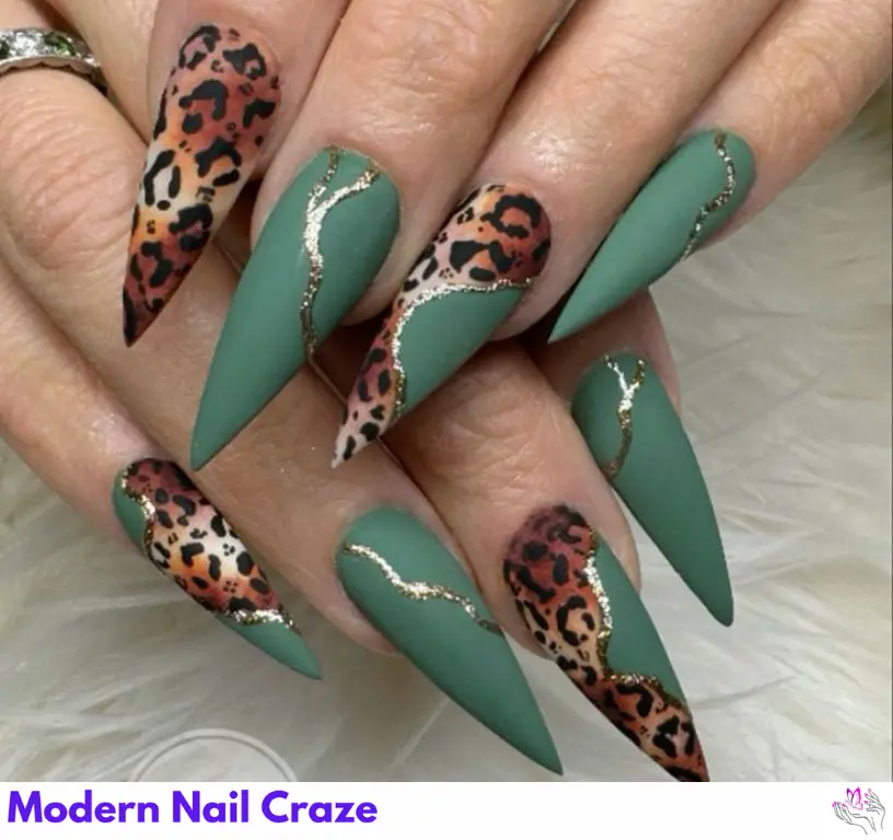  Elegant nude and green ballerina nails adorned with a chic leopard print design.