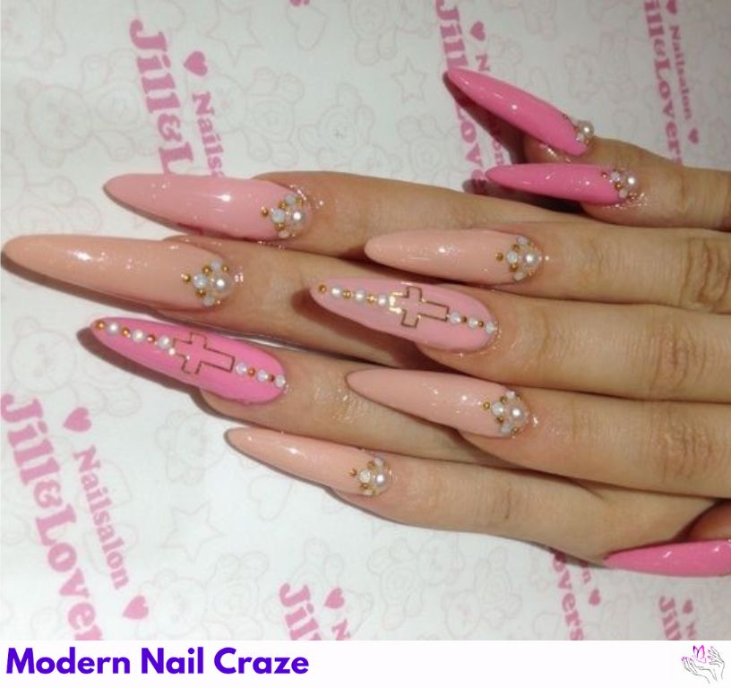 Pink Gothic Easter nails featuring bold cross designs and floral accents.