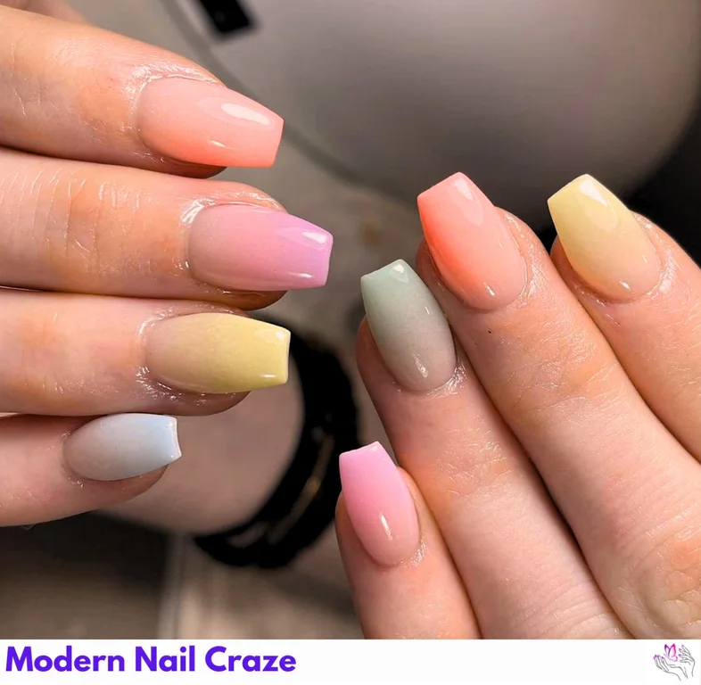 Rainbow Ombre Nails featuring a smooth gradient of colors, including orange, purple, yellow, and green for a colorful, dynamic look.