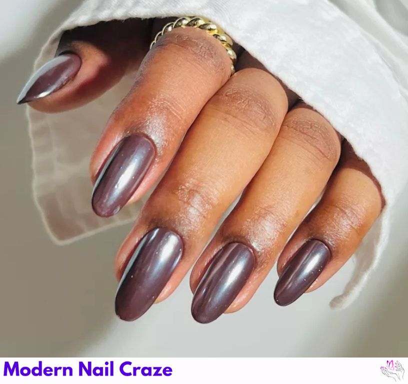 Iridescent chocolate brown nails with effortless sophistication.