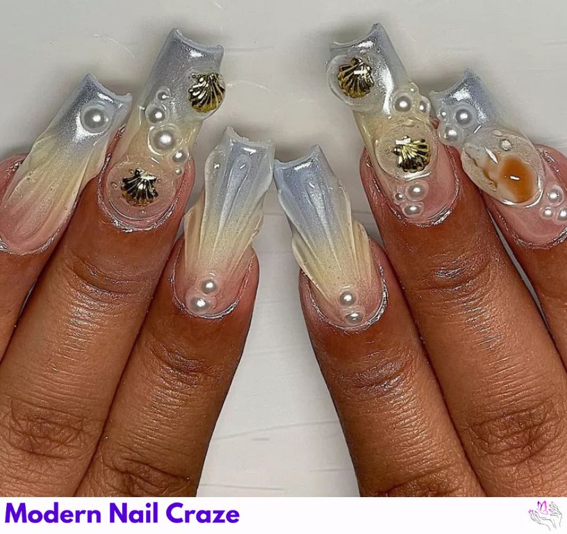 Square-shaped chrome seashell nails with bubble accents.