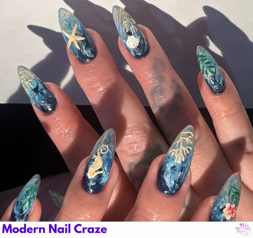 Deep sea-inspired nails with coral, seahorses, and shells.