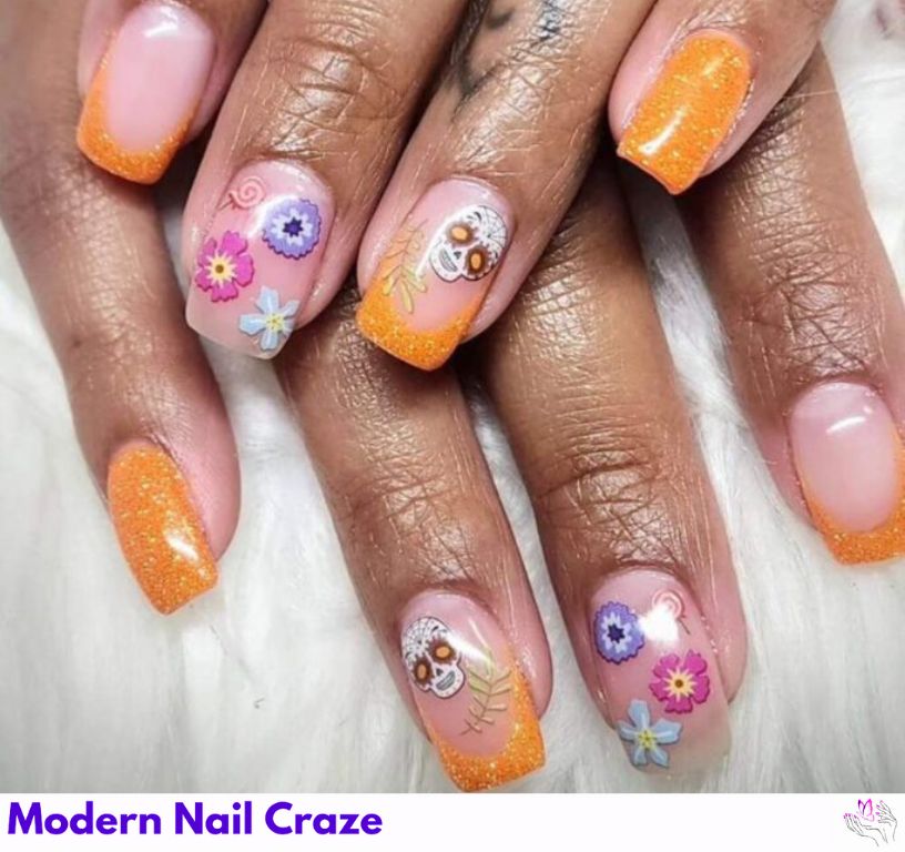 Colorful skulls and glittery orange nail designs.