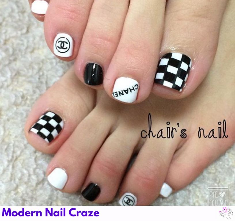 Modern geometric silver nail art with bold shapes."