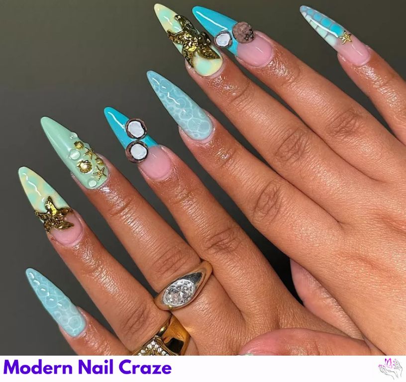 Playful long nails with 3D coconuts and gold starfishes.