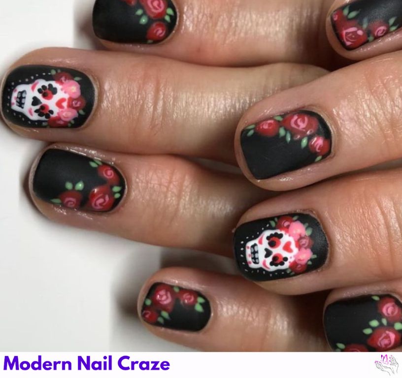 Black matte nails with roses and Catrina details.