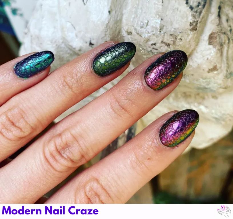 Reptilian Bubble Nails: Edgy reptilian textured nails with dark chrome shades.