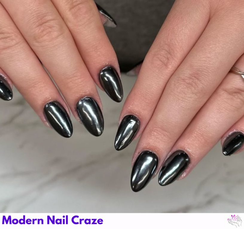 Bold gunmetal chrome nails with sleek polished effect. 