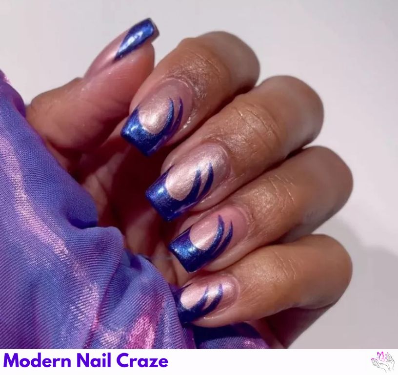 Ocean-inspired blue French nails with dreamy wave designs.
