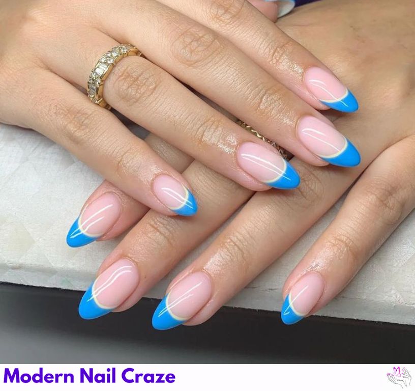 Glossy blue French tip gel nails with a sleek gel polish finish.