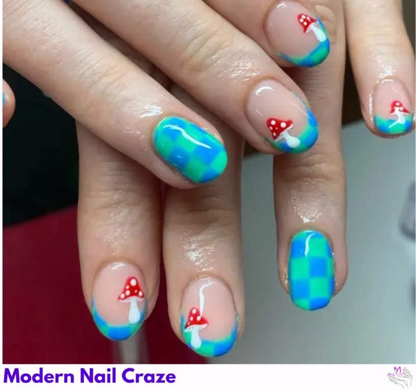 Playful blue French nails with checkered and mushroom art.
