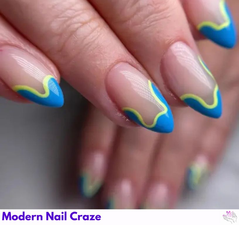 Artistic blue French nails featuring vibrant yellow wavy designs.