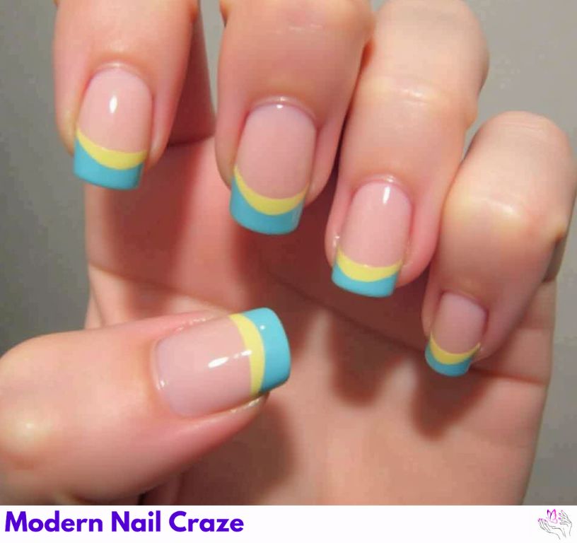 Fun blue and yellow French nails with creative and colorful combinations.
