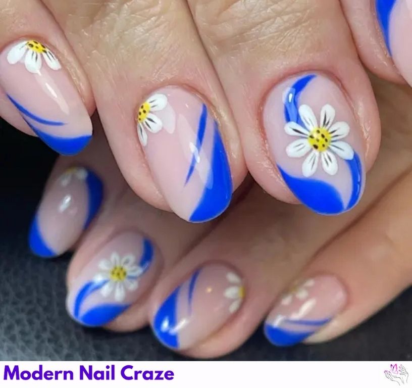 Playful blue French nails with a floral daisy accent.