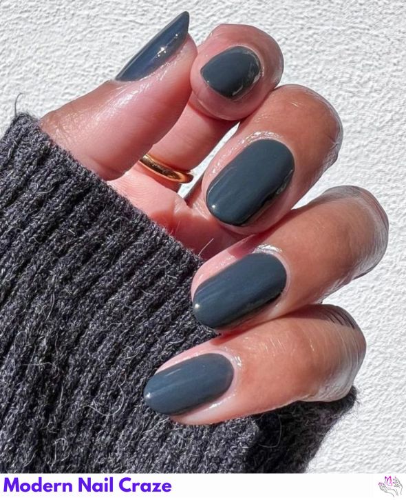 Chic solid dark gray nails with a minimalist look.