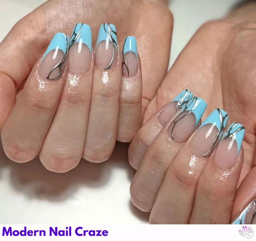Metallic blue French nails featuring molten silver nail art.