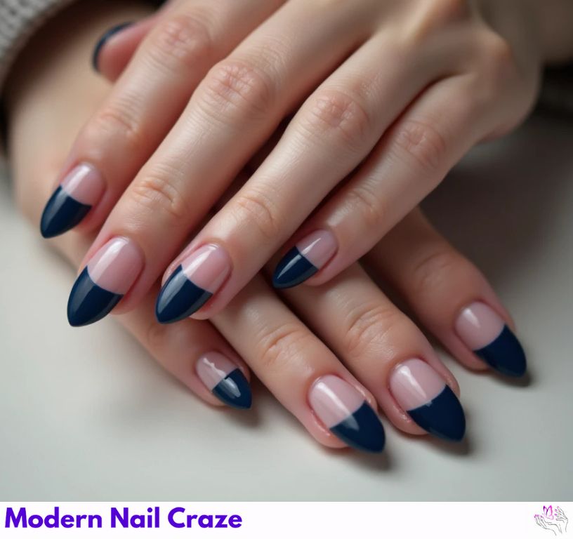 Deep Almond navy blue French nails with a refined and sophisticated look.