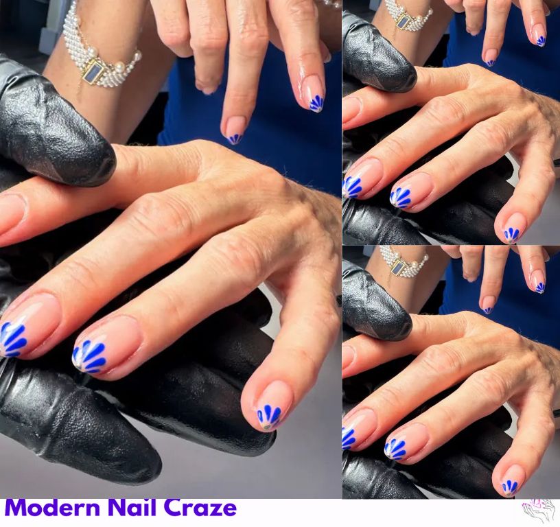 Delicate blue French nails with royal blue petal accents.