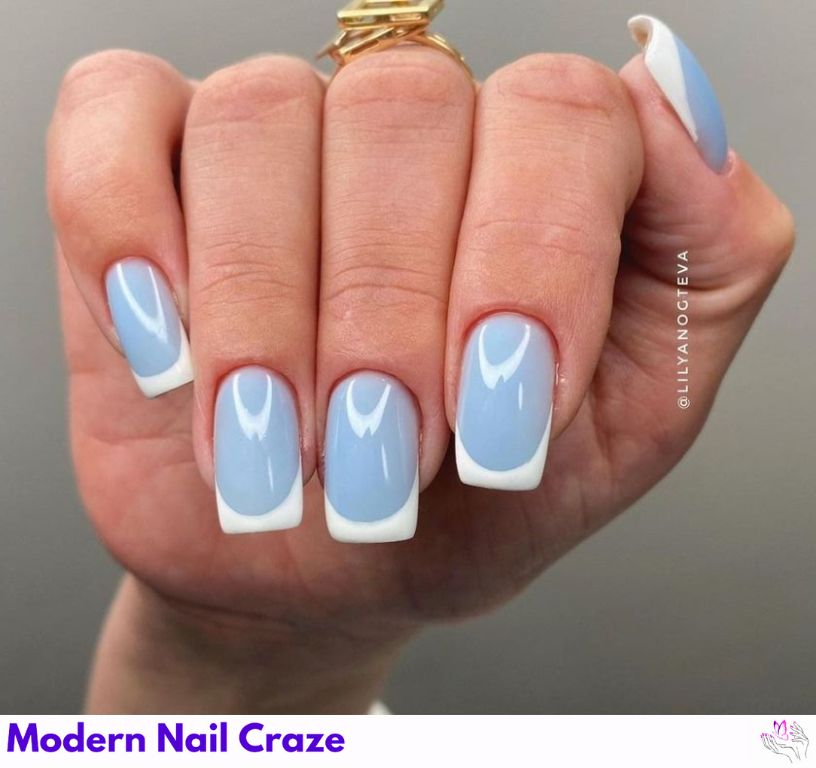 Soft sky blue and white French nails with a fresh and airy vibe.