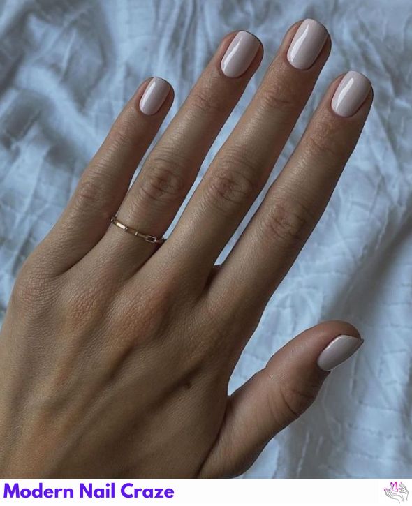 Soft pale pink nails with a classic, clean finish.