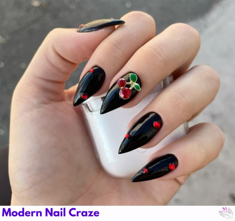 Rocker-chic matte black nails with design featuring red cherries.
